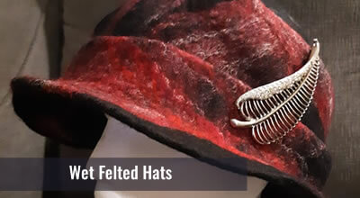 Learn how to create a wet felted hat that is unique and one of a kind using wool, silk and a resist. Cost is 120.00 which includes wool, silk, hat block and notes. The student can take home their resist and hat block.  Please pm for list of things to bring.
